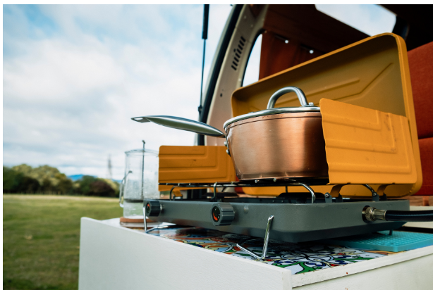 propane camping stove on back of vehicle