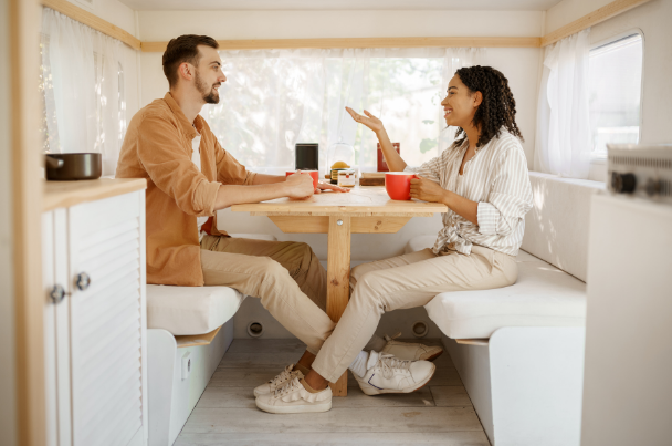 A couple talking while having a drink