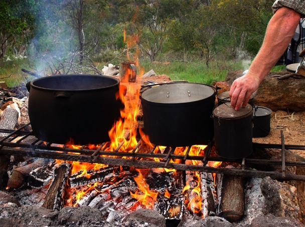 Cooking Pots and pans over a campfire