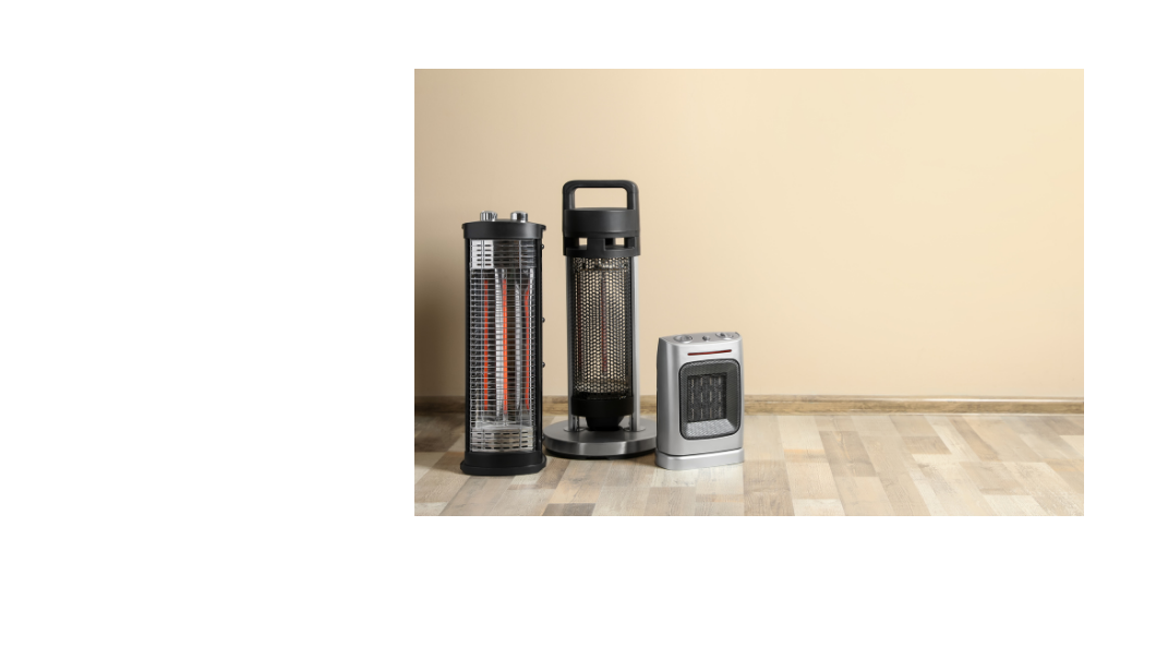 Three portable space heaters sitting next to each other on the floor